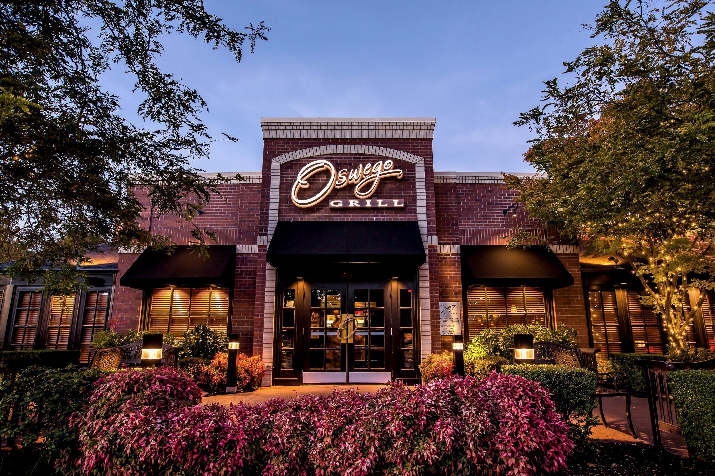 The welcoming facade of Oswego Grill, inviting guests into a story of culinary passion and tradition.